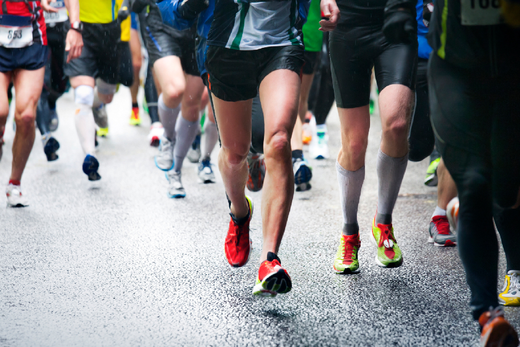 Marathon injury - Lower leg shot of marathon runners